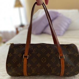 Very well used authentic LV barrel bag.